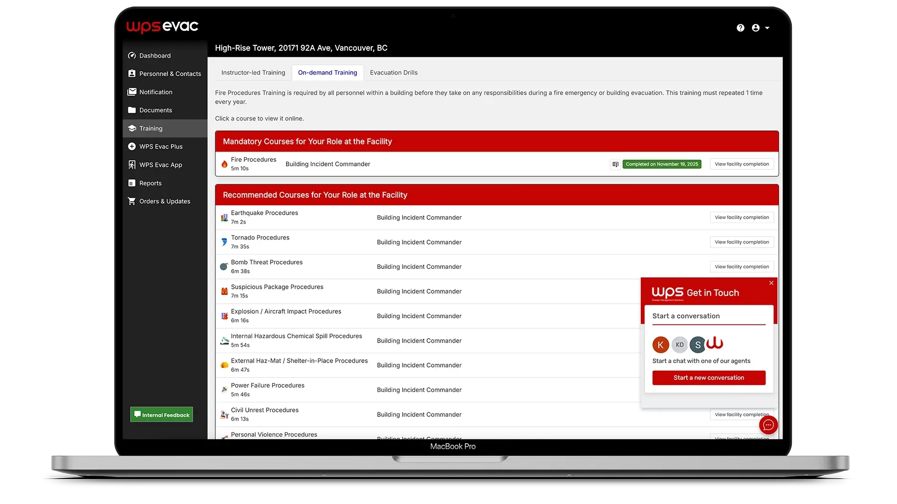On-demand emergency training software on a laptop displaying building safety compliance modules.