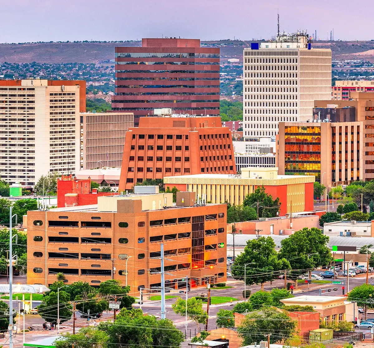 A comprehensive emergency training in Albuquerque being conducted for property managers and operations teams, illustrating high-rise evacuation routes, fire safety protocols, and multi-tenant emergency coordination plans inside a modern commercial office building.