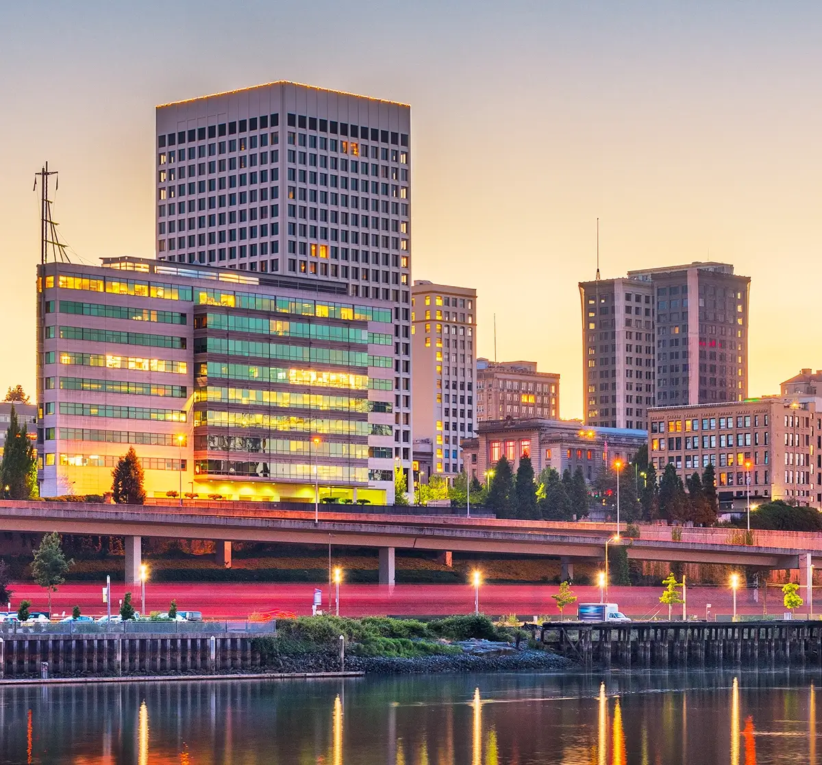 A comprehensive emergency training in Tacoma being conducted for property managers and operations teams, illustrating high-rise evacuation routes, fire safety protocols, and multi-tenant emergency coordination plans inside a modern commercial office building.