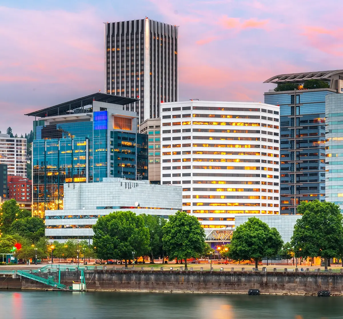 A comprehensive emergency training in Portland being conducted for property managers and operations teams, illustrating high-rise evacuation routes, fire safety protocols, and multi-tenant emergency coordination plans inside a modern commercial office building.
