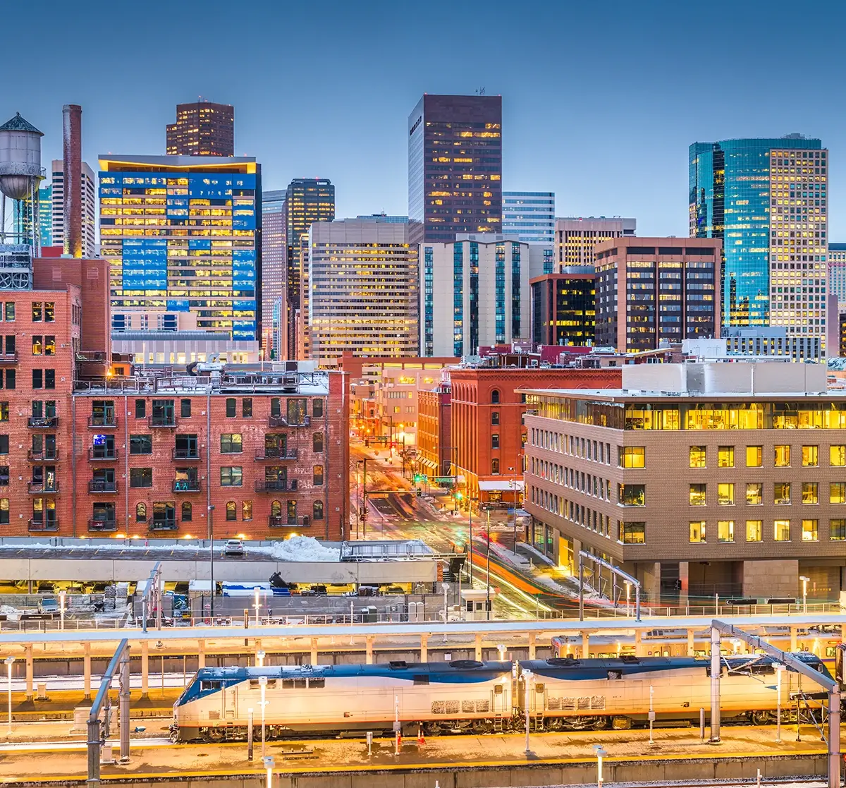 A comprehensive emergency training in Denver being conducted for property managers and operations teams, illustrating high-rise evacuation routes, fire safety protocols, and multi-tenant emergency coordination plans inside a modern commercial office building.