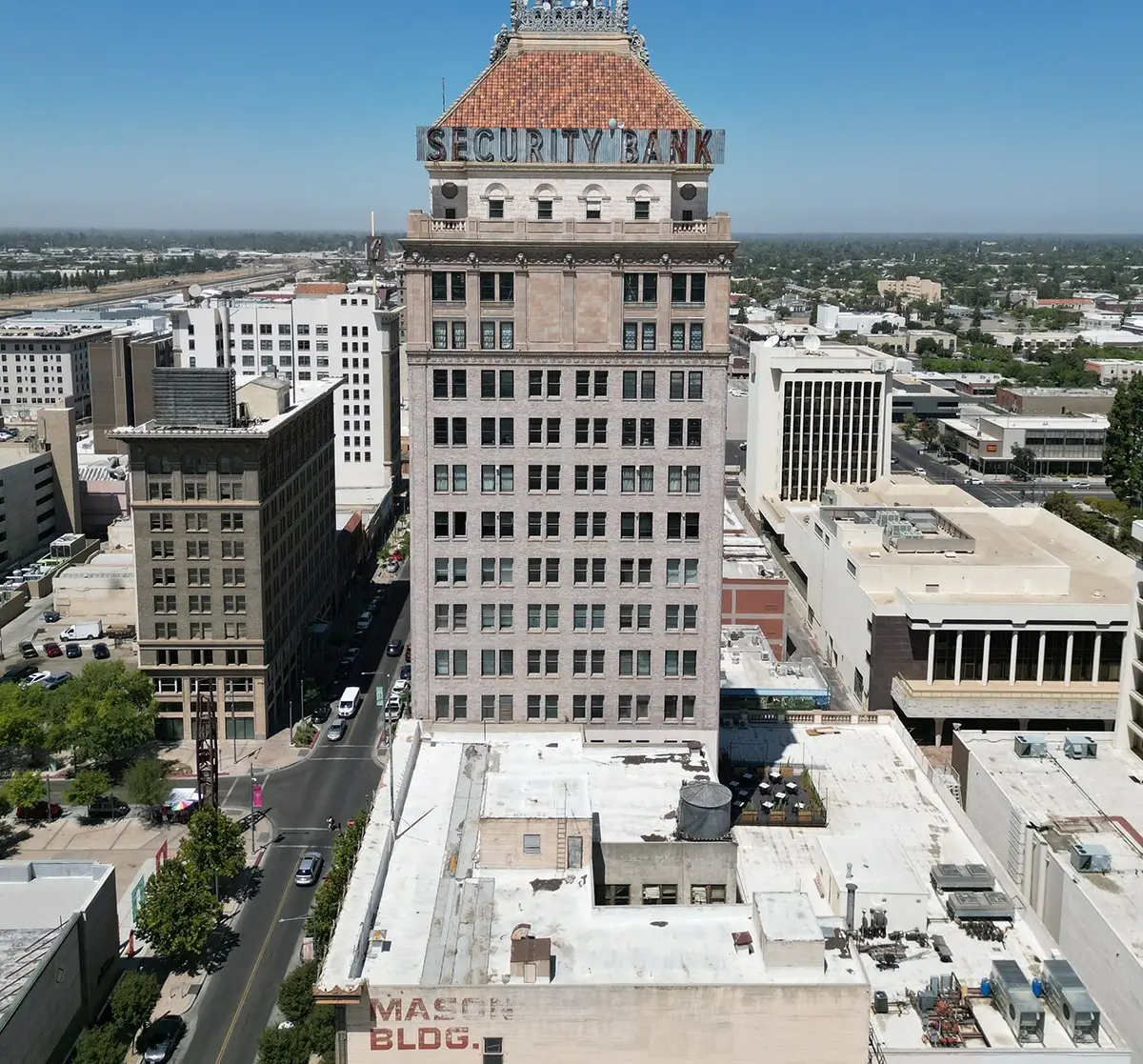 A comprehensive emergency training in Fresno being conducted for property managers and operations teams, illustrating high-rise evacuation routes, fire safety protocols, and multi-tenant emergency coordination plans inside a modern commercial office building.